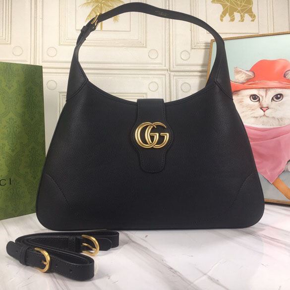 G*u*i top handle bags